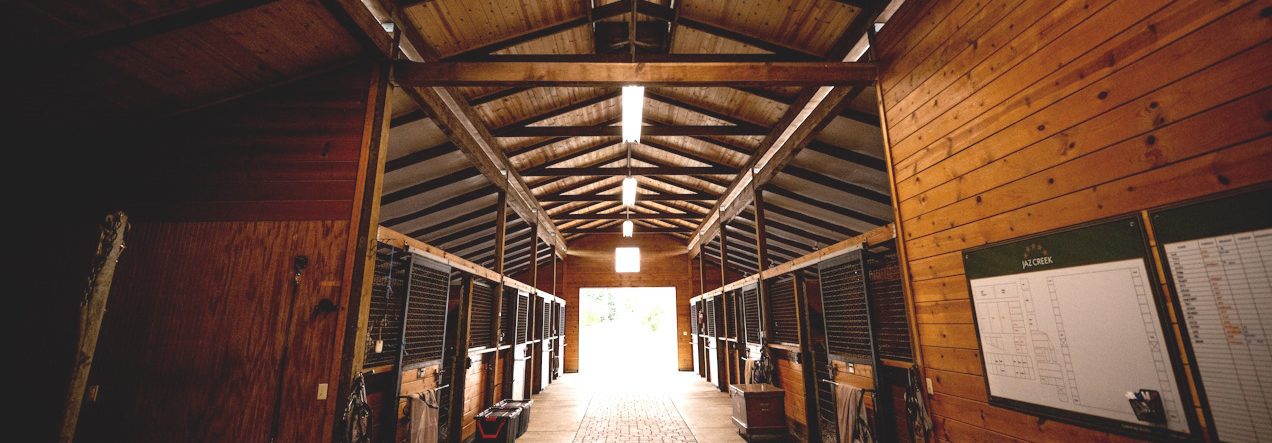 Immaculate horse stalls with automatic waterers at Jaz Creek boarding facility Sonoma County